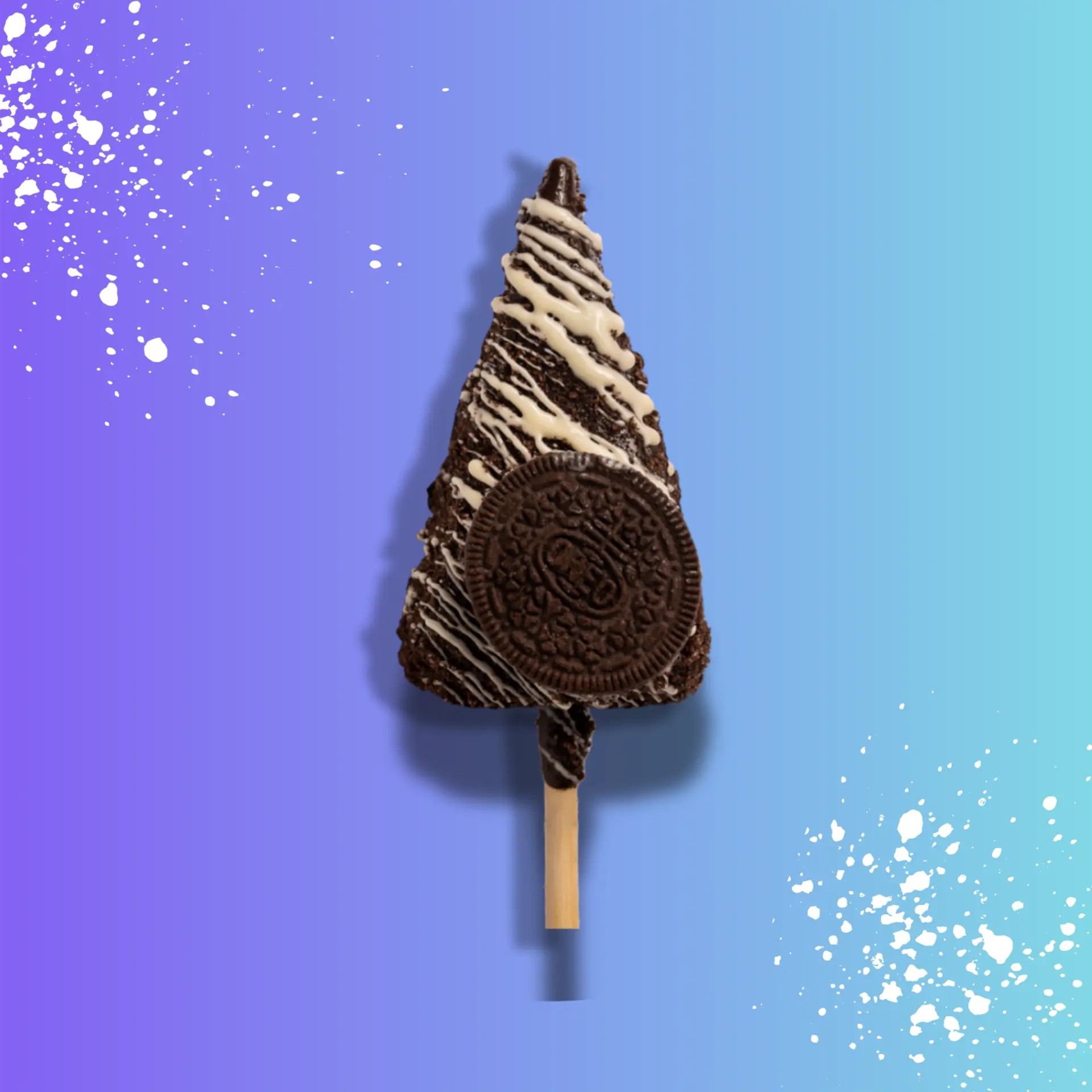 Chocolate-dipped cheesecake stick rolled in Oreo crumbs with an Oreo sauce drizzle